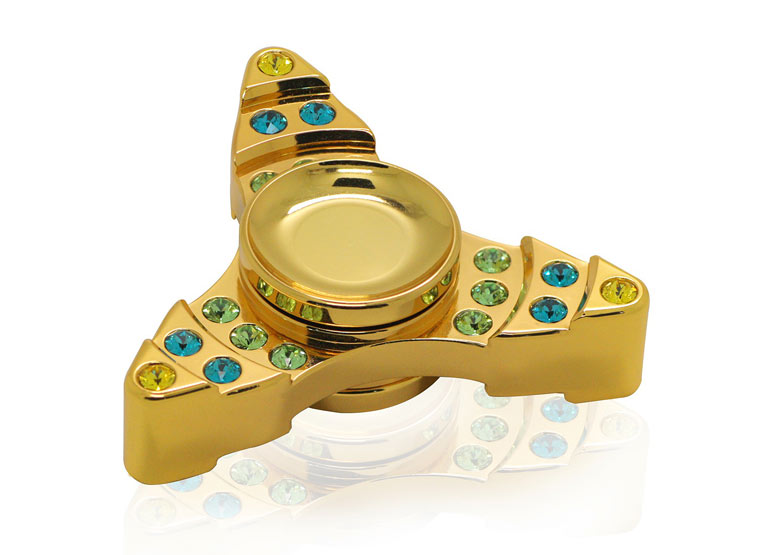fidget spinner med guld og sten