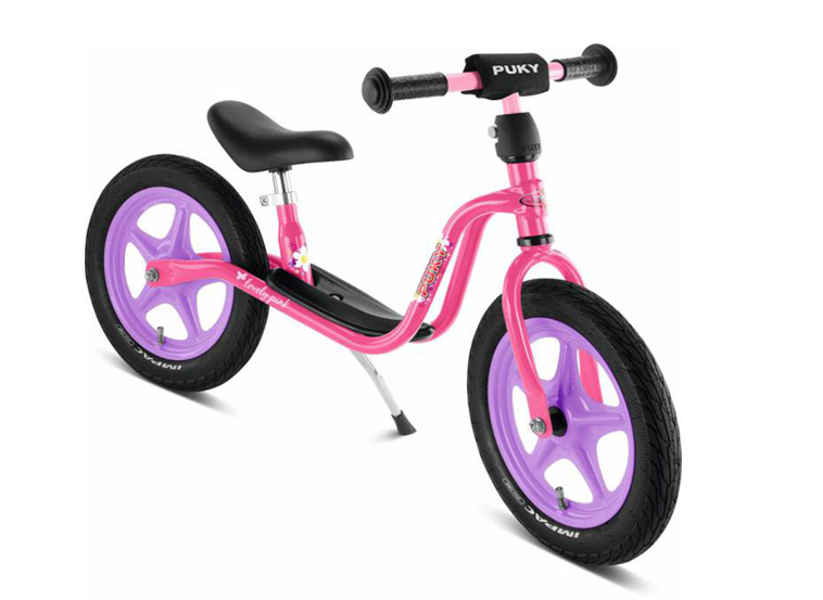 lyserød løbecykel